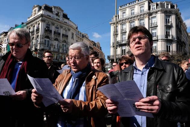 Brussels region Minister of Finance, Budget and External relations Guy Vanhengel and Flemish Minister of Brussels, Culture, Media and Youth Sven Gatz pictured at the Music For Brussels: One City, One Love event at the Beursplein - Place de la Bourse square in Brussels, organized by multiple cultural institutions, Sunday 03 April 2016. In the morning of Tuesday 22nd of March two bombs exploded in the departure hall of Brussels Airport and another one in the Maelbeek - Maalbeek subway station, which made around 35 deadly victims, not including the suicide bombers, and 340 injured people in total. ISIL (Islamic State of Iraq and the Levant - Daesh - ISIS) claimed responsibility for these attacks.  NICOLASxMAETERLINCK 04825494