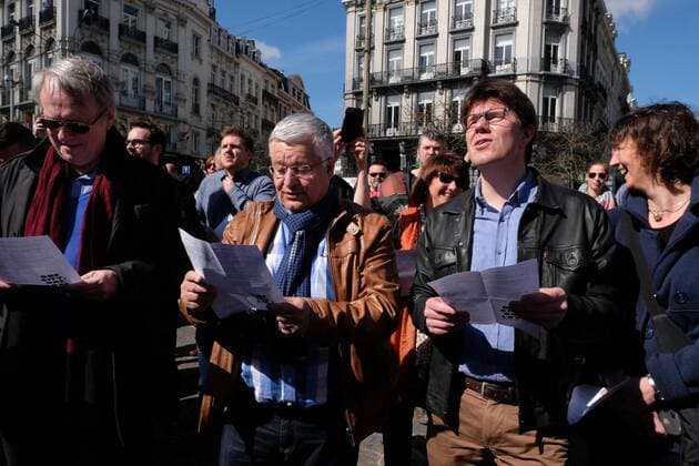 Brussels region Minister of Finance, Budget and External relations Guy Vanhengel and Flemish Minister of Brussels, Culture, Media and Youth Sven Gatz pictured at the Music For Brussels: One City, One Love event at the Beursplein - Place de la Bourse square in Brussels, organized by multiple cultural institutions, Sunday 03 April 2016. In the morning of Tuesday 22nd of March two bombs exploded in the departure hall of Brussels Airport and another one in the Maelbeek - Maalbeek subway station, which made around 35 deadly victims, not including the suicide bombers, and 340 injured people in total. ISIL (Islamic State of Iraq and the Levant - Daesh - ISIS) claimed responsibility for these attacks.  NICOLASxMAETERLINCK 04825495