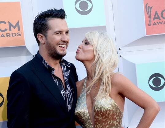 Country Music Awards in Las Vegas Singer Luke Bryan (L) and Caroline Boyer attend the 51st annual Academy of Country Music Awards held at the MGM Grand Arena in Las Vegas, Nevada on April 3, 2016.  LAV20160403174 JIMxRUYMEN