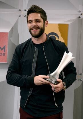 Singer Thomas Rhett, winner of Single Record of the Year for Die a Happy Man, backstage at the 51st annual Academy of Country Music Awards held at the MGM Grand Arena in Las Vegas, Nevada on April 3, 2016.  LAV20160403403 JIMxRUYMEN