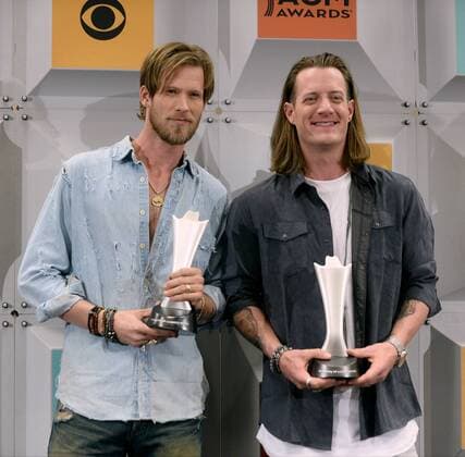 (L-R) Singers Brian Kelley and Tyler Hubbard of Florida Georgia Line, winners of Vocal Duo of the Year award, backstage at the 51st annual Academy of Country Music Awards held at the MGM Grand Arena in Las Vegas, Nevada on April 3, 2016.  LAV20160403399 JIMxRUYMEN
