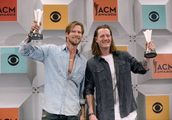 (L-R) Singers Brian Kelley and Tyler Hubbard of Florida Georgia Line, winners of Vocal Duo of the Year award, backstage at the 51st annual Academy of Country Music Awards held at the MGM Grand Arena in Las Vegas, Nevada on April 3, 2016.  LAV20160403400 JIMxRUYMEN
