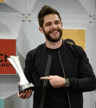 Country Music Awards in Las Vegas Singer Thomas Rhett, winner of Single Record of the Year for Die a Happy Man, appears backstage at the 51st annual Academy of Country Music Awards held at the MGM Grand Arena in Las Vegas, Nevada on April 3, 2016.  LAV20160403808 JIMxRUYMEN