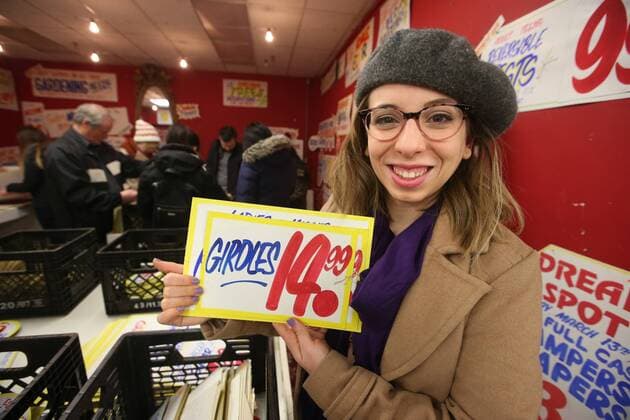 April 3, 2016 - Toronto, ON, Canada - TORONTO, ON - APRIL 3 - -Chantal Gouveia holds up a sign that she wants to buy at Honest Ed s hand painted sign sale. Toronto Canada  - ZUMAt14_