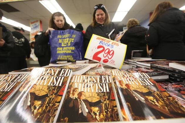 April 3, 2016 - Toronto, ON, Canada - TORONTO, ON - APRIL 3 - -Debbie Johnson(left) and Kris Moak hold up Honest Ed s books that they wants to buy at Honest Ed s hand painted sign sale. Toronto Canada  - ZUMAt14_