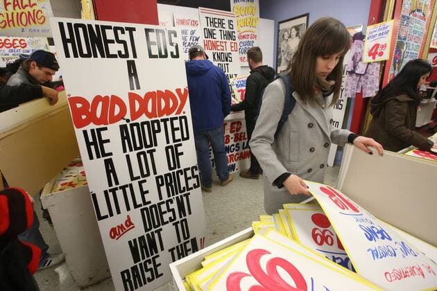 April 3, 2016 - Toronto, ON, Canada - TORONTO, ON - APRIL 3 - -Honest Ed goers look through piles of signs for purchase at Honest Ed s hand painted sign sale. Toronto Canada  - ZUMAt14_