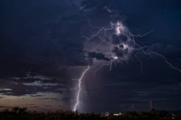 Aug. 22, 2011 - ARIZONA, USA: Lightning strikes over desert skyline. A TECHNICIANÃ¢â‚¬â„¢S hobby for storm chasing has led to these explosive pictures of lightning. Giant bolts of lightning can be seen striking the Arizona landscape, dominating the skyline. The incredible pictures show the visual impact of lightning during some of the most stormy conditions to rock North America. US-born technician, Steven Maguire (49) is a daring storm-chaser in his spare time Ã¢â‚¬œ and he describes the pictures he took of the lightning strikes captured in Arizona.  - ZUMAm148