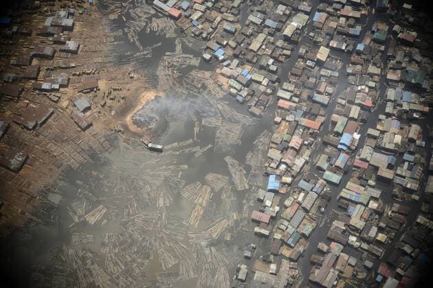 April 13, 2016 - Lagos, Nigeria - Aerial view of Oko-Baba plank market in Lagos, the commercial capital of Nigeria on Wednesday, April 13 2016. The largest plank market in the state is due for relocation to a news site, Owu-Ikosi axis of Lagos in six months time. The state Governor, Akinwunmi Ambode has declared. Photo: Kunle Ajayi Lagos Nigeria  - ZUMAn230