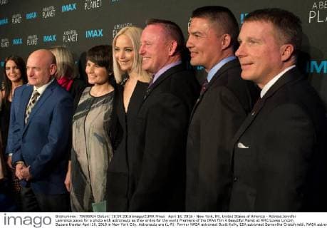 April 16, 2016 - New York, NY, United States of America - Actress Jennifer Lawrence poses for a photo with astronauts as they arrive for the world Premiere of the IMAX film A Beautiful Planet at AMC Lowes Lincoln Square theater April 16, 2016 in New York City. Astronauts are (L-R): Former NASA astronaut Scott Kelly, ESA astronaut Samantha Cristoforetti, NASA astronaut Barry Wilmore, NASA astronaut Kjell Lindgren, and NASA astronaut Terry Virts. New York United States of America - ZUMAp138