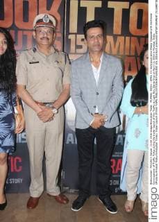 MUMBAI, INDIA - APRIL 13: Bollywood actor Manoj Vajpayee with Additional Commissioner of Traffic Police during the trailer launch of film Traffic at Light Box, Santa Cruz on April 13, 2016 in Mumbai, India. (Photo by Pramod Thakur Hindustan Times) Trailer Launch Of Film Traffic