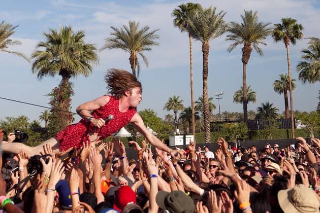Apr. 16, 2011 - Indio, California, U.S - Cage the Elephant vocalist Matt Shultz dives in the crowd during the 2011 Coachella Music and Arts Festival held at Empire Polo Fields on in Indio, California - ZUMAx54_