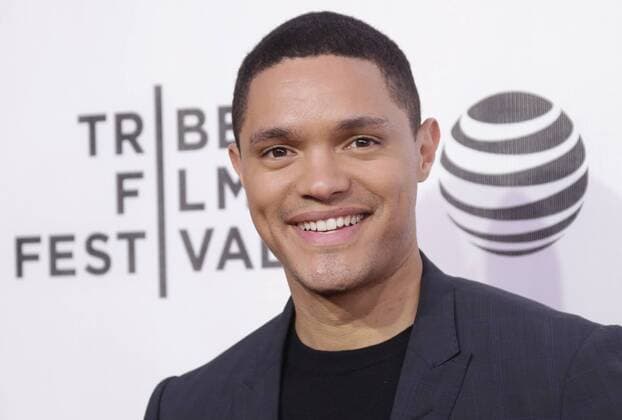 Trevor Noah arrives on the red carpet at the A Hologram for the King Premiere at the 2016 Tribeca Film Festival at BMCC John Zuccotti Theater on April 20, 2016 in New York City.  NYP20160420106 JOHNxANGELILLO