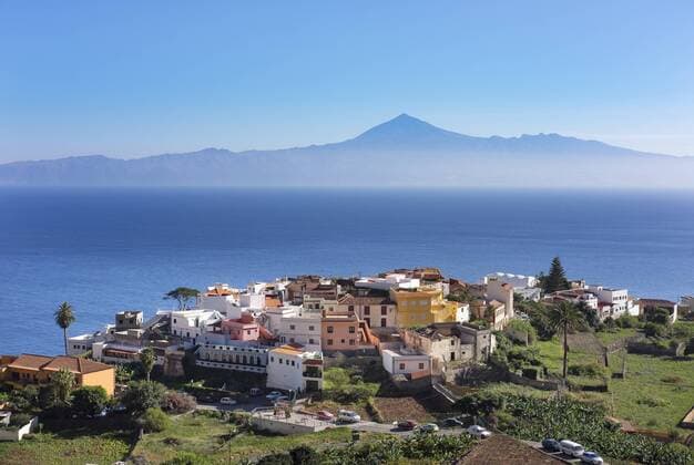 Spain, Canary Islands, La Gomera, Agulo, Teneriffa Island with Pico del Teide in the background  SIEF006990