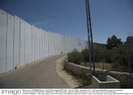 April 15, 2016 - Jerusalem, U.S. - The Israeli West Bank barrier or separation wall surrounding the Arab town of Bethlehem. Life in Jerusalem, Israel and Palestine is said to be slowly returning to normal following months of attacks in which 28 Israelis and two Americans were killed by Palestinian attacks, one by a bus bombing, and at least 188 Palestinians killed by Israeli fire. Jerusalem U.S. - ZUMAmj3_