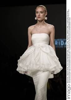 April 26, 2016 - Barcelona, Catalonia, Spain - A model walks the runway presenting a wedding dress of the Spring Summer 2017 collection during the Rosa Clara catwalk show at the Barcelona Bridal Fashion Week 2016 Barcelona Spain - ZUMAo105