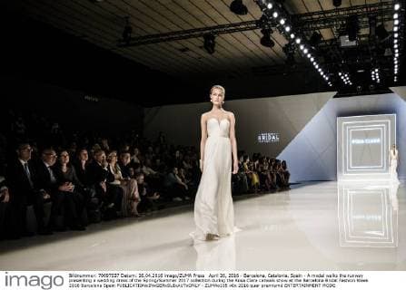 April 26, 2016 - Barcelona, Catalonia, Spain - A model walks the runway presenting a wedding dress of the Spring Summer 2017 collection during the Rosa Clara catwalk show at the Barcelona Bridal Fashion Week 2016 Barcelona Spain - ZUMAo105