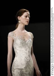 April 26, 2016 - Barcelona, Catalonia, Spain - A model walks the runway presenting a wedding dress of the Spring Summer 2017 collection during the Rosa Clara catwalk show at the Barcelona Bridal Fashion Week 2016 Barcelona Spain - ZUMAo105