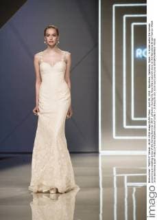 April 26, 2016 - Barcelona, Catalonia, Spain - A model walks the runway presenting a wedding dress of the Spring Summer 2017 collection during the Rosa Clara catwalk show at the Barcelona Bridal Fashion Week 2016 Barcelona Spain - ZUMAo105