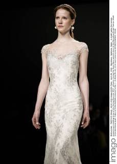 April 26, 2016 - Barcelona, Catalonia, Spain - A model walks the runway presenting a wedding dress of the Spring Summer 2017 collection during the Rosa Clara catwalk show at the Barcelona Bridal Fashion Week 2016 Barcelona Spain - ZUMAo105