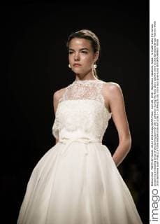April 26, 2016 - Barcelona, Catalonia, Spain - A model walks the runway presenting a wedding dress of the Spring Summer 2017 collection during the Rosa Clara catwalk show at the Barcelona Bridal Fashion Week 2016 Barcelona Spain - ZUMAo105