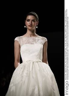 April 26, 2016 - Barcelona, Catalonia, Spain - A model walks the runway presenting a wedding dress of the Spring Summer 2017 collection during the Rosa Clara catwalk show at the Barcelona Bridal Fashion Week 2016 Barcelona Spain - ZUMAo105