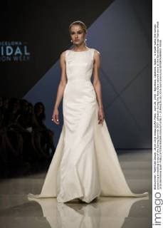April 26, 2016 - Barcelona, Catalonia, Spain - A model walks the runway presenting a wedding dress of the Spring Summer 2017 collection during the Rosa Clara catwalk show at the Barcelona Bridal Fashion Week 2016 Barcelona Spain - ZUMAo105