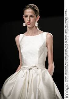 April 26, 2016 - Barcelona, Catalonia, Spain - A model walks the runway presenting a wedding dress of the Spring Summer 2017 collection during the Rosa Clara catwalk show at the Barcelona Bridal Fashion Week 2016 Barcelona Spain - ZUMAo105