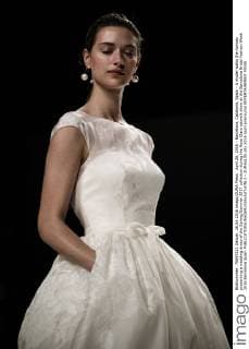 April 26, 2016 - Barcelona, Catalonia, Spain - A model walks the runway presenting a wedding dress of the Spring Summer 2017 collection during the Rosa Clara catwalk show at the Barcelona Bridal Fashion Week 2016 Barcelona Spain - ZUMAo105
