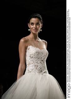 April 26, 2016 - Barcelona, Catalonia, Spain - A model walks the runway presenting a wedding dress of the Spring Summer 2017 collection during the Rosa Clara catwalk show at the Barcelona Bridal Fashion Week 2016 Barcelona Spain - ZUMAo105