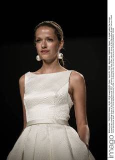 April 26, 2016 - Barcelona, Catalonia, Spain - A model walks the runway presenting a wedding dress of the Spring Summer 2017 collection during the Rosa Clara catwalk show at the Barcelona Bridal Fashion Week 2016 Barcelona Spain - ZUMAo105