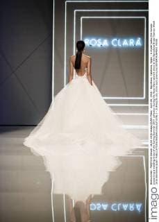 April 26, 2016 - Barcelona, Catalonia, Spain - A model walks the runway presenting a wedding dress of the Spring Summer 2017 collection during the Rosa Clara catwalk show at the Barcelona Bridal Fashion Week 2016 Barcelona Spain - ZUMAo105