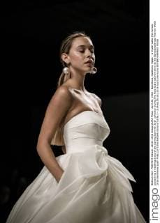 April 26, 2016 - Barcelona, Catalonia, Spain - A model walks the runway presenting a wedding dress of the Spring Summer 2017 collection during the Rosa Clara catwalk show at the Barcelona Bridal Fashion Week 2016 Barcelona Spain - ZUMAo105