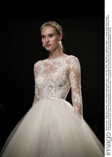 April 26, 2016 - Barcelona, Catalonia, Spain - A model walks the runway presenting a wedding dress of the Spring Summer 2017 collection during the Rosa Clara catwalk show at the Barcelona Bridal Fashion Week 2016 Barcelona Spain - ZUMAo105