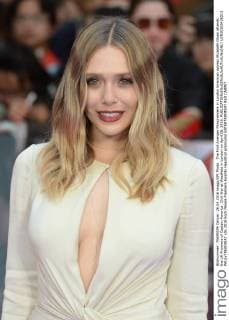 The First Avenger Filmpremiere in London American actress Elizabeth Olsen attends the UK Premiere of Captain America: Civil War at Westfield in London on April 26, 2016.  LON20160426213 PAULxTREADWAY