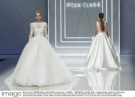 (160426) -- BARCELONA, April 26, 2016 -- Models present creations by Rosa Clara during the Barcelona Bridal Fashion Week in Barcelona, Spain, April 26, 2016. Barcelona Bridal Fashion Week kicks off here on Tuesday. ) SPAIN-BARCELONA-BRIDAL FAHION WEEK PauxBarrena 