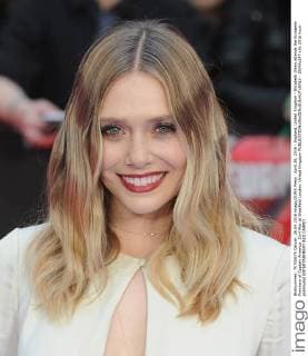 April 26, 2016 - England, United Kingdom - Elizabeth Olsen attends the European Premiere of Captain America: Civil War at Westfield London. United Kingdom - ZUMAs147