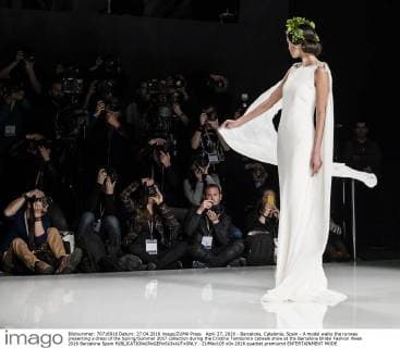 April 27, 2016 - Barcelona, Catalonia, Spain - A model walks the runway presenting a dress of the Spring Summer 2017 collection during the Cristina Tamborero catwalk show at the Barcelona Bridal Fashion Week 2016 Barcelona Spain - ZUMAo105