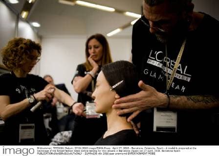 April 27, 2016 - Barcelona, Catalonia, Spain - A model is prepared at the backstage of the Bridal Fashion Week before leaving for the catwalk in Barcelona (Spain) on 27 April, 2016. Barcelona Spain  - ZUMAn230