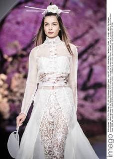 April 27, 2016 - Barcelona, Catalonia, Spain - A model walks the runway presenting a wedding dress of the Spring Summer 2017 collection during the Inmaculada Garcia catwalk show at the Barcelona Bridal Fashion Week 2016 Barcelona Spain - ZUMAo105