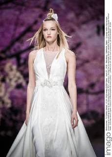 April 27, 2016 - Barcelona, Catalonia, Spain - A model walks the runway presenting a wedding dress of the Spring Summer 2017 collection during the Inmaculada Garcia catwalk show at the Barcelona Bridal Fashion Week 2016 Barcelona Spain - ZUMAo105