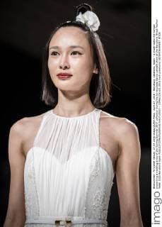 April 27, 2016 - Barcelona, Catalonia, Spain - A model walks the runway presenting a wedding dress of the Spring Summer 2017 collection during the Inmaculada Garcia catwalk show at the Barcelona Bridal Fashion Week 2016 Barcelona Spain - ZUMAo105
