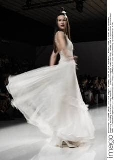 April 27, 2016 - Barcelona, Catalonia, Spain - A model walks the runway presenting a wedding dress of the Spring Summer 2017 collection during the Inmaculada Garcia catwalk show at the Barcelona Bridal Fashion Week 2016 Barcelona Spain - ZUMAo105