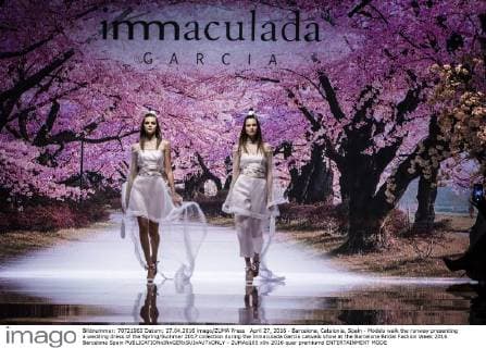 April 27, 2016 - Barcelona, Catalonia, Spain - Models walk the runway presenting a wedding dress of the Spring Summer 2017 collection during the Inmaculada Garcia catwalk show at the Barcelona Bridal Fashion Week 2016 Barcelona Spain - ZUMAo105