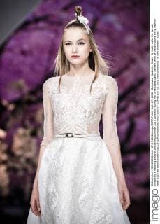 April 27, 2016 - Barcelona, Catalonia, Spain - A model walks the runway presenting a wedding dress of the Spring Summer 2017 collection during the Inmaculada Garcia catwalk show at the Barcelona Bridal Fashion Week 2016 Barcelona Spain - ZUMAo105