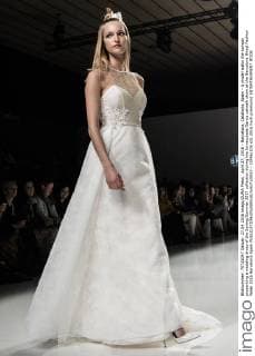 April 27, 2016 - Barcelona, Catalonia, Spain - A model walks the runway presenting a wedding dress of the Spring Summer 2017 collection during the Inmaculada Garcia catwalk show at the Barcelona Bridal Fashion Week 2016 Barcelona Spain - ZUMAo105