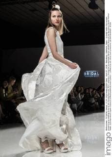 April 27, 2016 - Barcelona, Catalonia, Spain - A model walks the runway presenting a wedding dress of the Spring Summer 2017 collection during the Inmaculada Garcia catwalk show at the Barcelona Bridal Fashion Week 2016 Barcelona Spain - ZUMAo105
