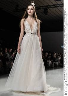 April 27, 2016 - Barcelona, Catalonia, Spain - A model walks the runway presenting a wedding dress of the Spring Summer 2017 collection during the Inmaculada Garcia catwalk show at the Barcelona Bridal Fashion Week 2016 Barcelona Spain - ZUMAo105