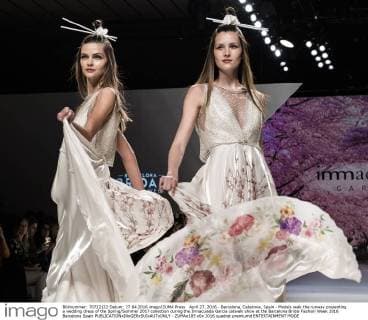 April 27, 2016 - Barcelona, Catalonia, Spain - Models walk the runway presenting a wedding dress of the Spring Summer 2017 collection during the Inmaculada Garcia catwalk show at the Barcelona Bridal Fashion Week 2016 Barcelona Spain - ZUMAo105