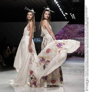 April 27, 2016 - Barcelona, Catalonia, Spain - Models walk the runway presenting a wedding dress of the Spring Summer 2017 collection during the Inmaculada Garcia catwalk show at the Barcelona Bridal Fashion Week 2016 Barcelona Spain - ZUMAo105