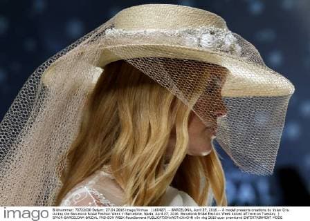 (160427) -- BARCELONA, April 27, 2016 -- A model presents creations by Yolan Cris during the Barcelona Bridal Fashion Week in Barcelona, Spain, April 27, 2016. Barcelona Bridal Fashion Week kicked off here on Tuesday. ) SPAIN-BARCELONA-BRIDAL FASHION WEEK PauxBarrena 